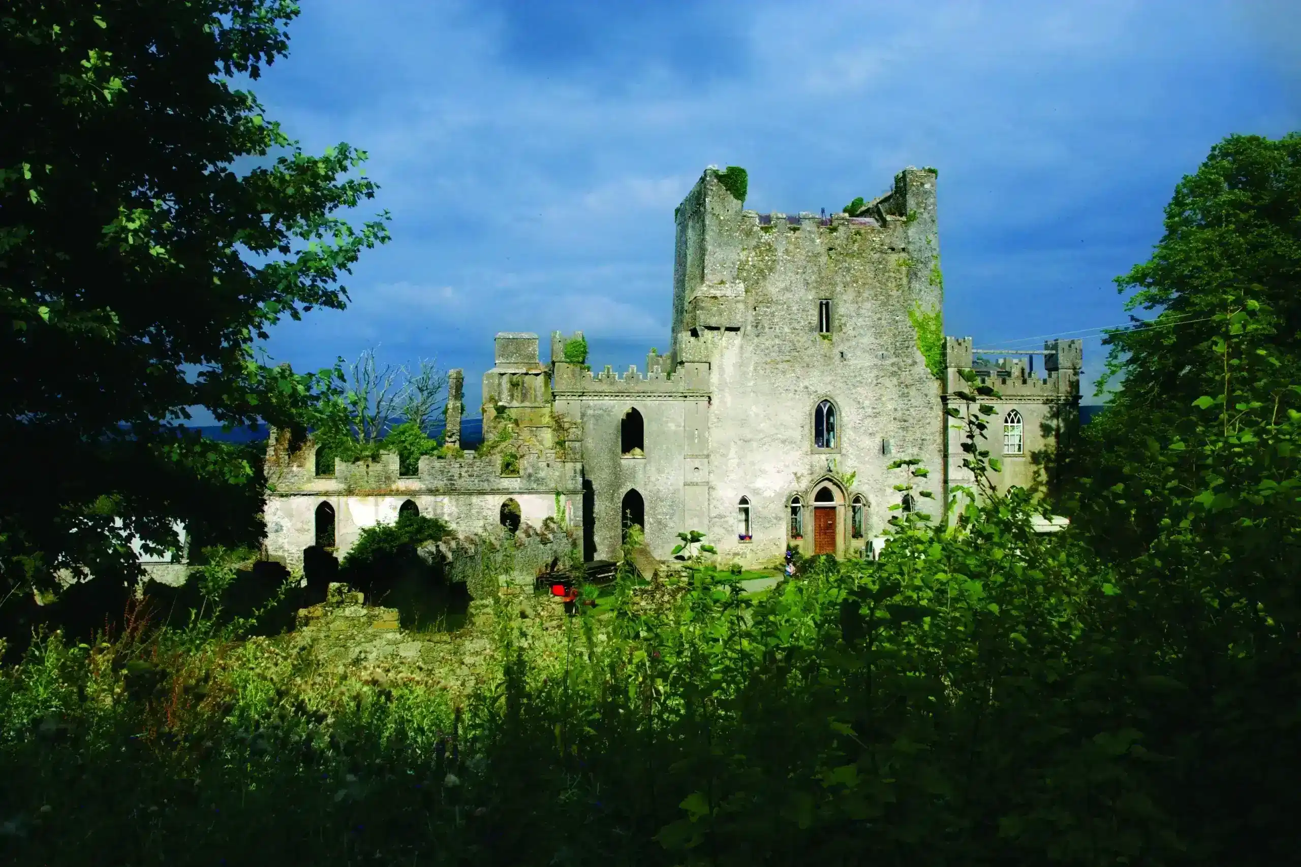 Landscape of historical ruins under a cloudy sky, offering a glimpse into the past.